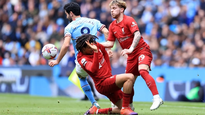 Ilkay Gundogon under pressure from Liverpool's Trent Alexander-Arnold and Harvey Elliott last year