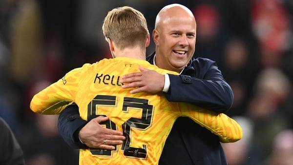 Caoimhin Kelleher with Arne Slot
