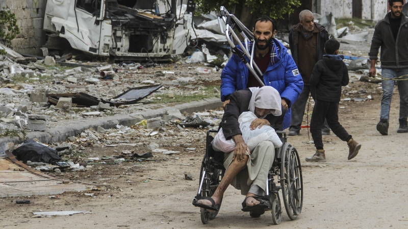 Palestinian families flee Beit Lahia with what they can take with them in Gaza City