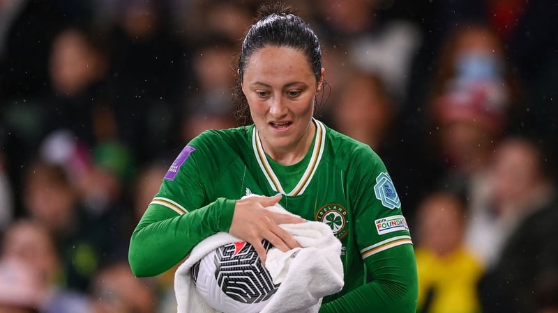 Megan Campbell dries the ball before taking a thro-in against England