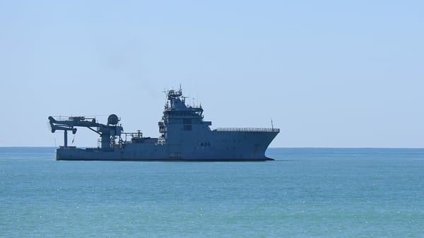 HMNZS Manawanui is seen sitting offshore in February of this year