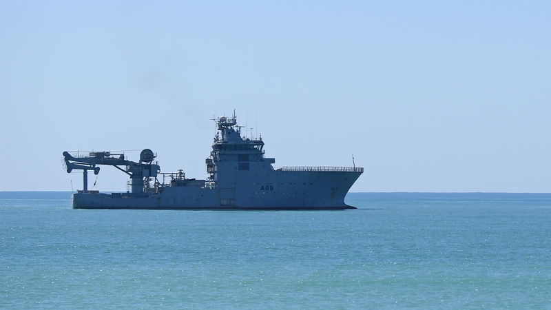 HMNZS Manawanui is seen sitting offshore in February of this year