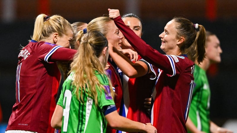 Guro Bergsvand of Norway, centre, celebrates with team-mates after scoring her side's fourth goal
