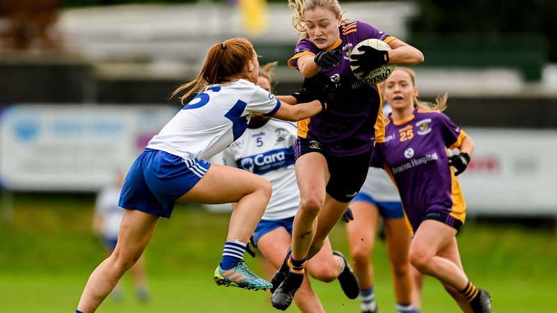 Grace Kós of Kilmacud Crokes is ctackled by Kayla O'Connor