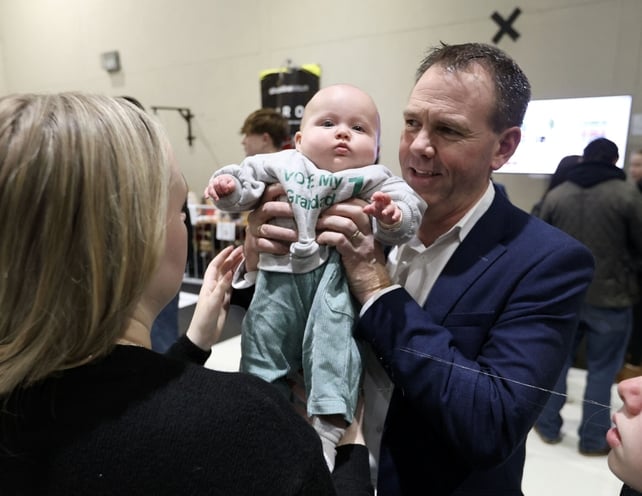 Sinn Féin's John Brady, who is on course to be re-elected in Wicklow, with his four month-old grand-daughter Sadie and her mum Siobhradh in Wicklow