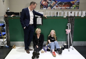 John Brady's wife Gayle and daughter Crola Brady, 12, take a break