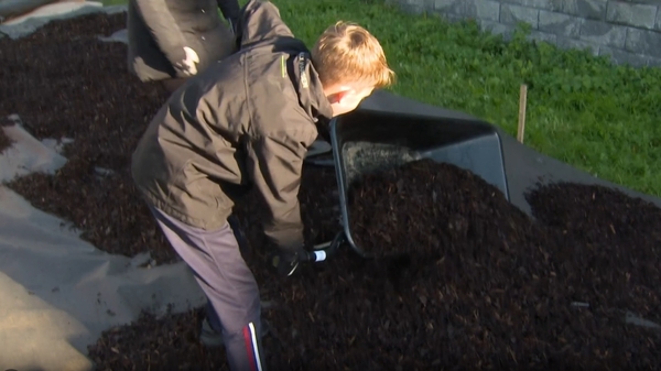 Getting your hands dirty to build something cool at school.