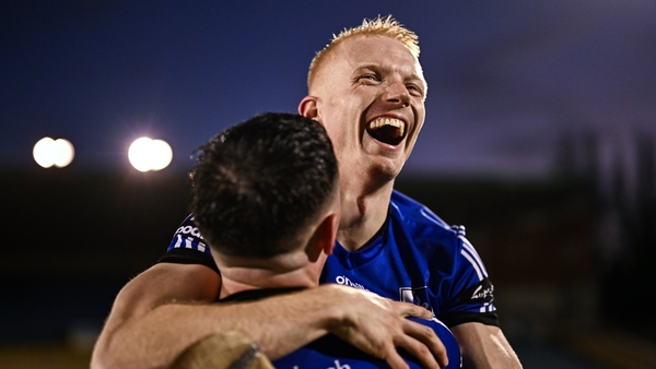Sarsfields players Cian Darcy, behind, and James Sweeney celebrate after victory over Ballygunner