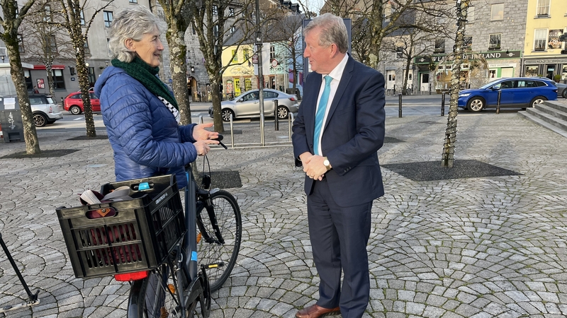 Catherine Connolly and Séan Canney discuss their options during a casual meet up at the Spanish Arch in Galway
