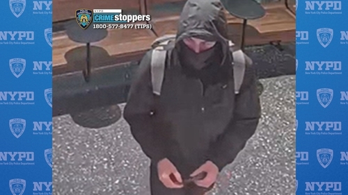 Police are still searching for the masked suspect (Pic: NYPD News)