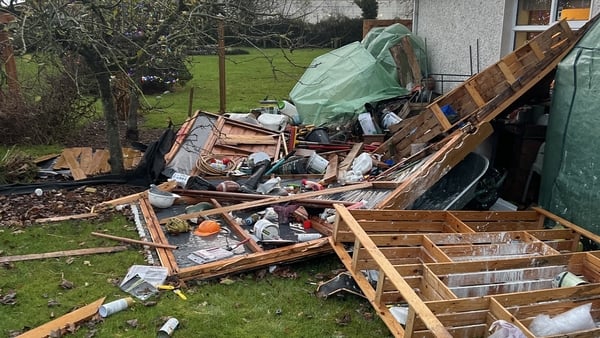 Strong winds and heavy rain were experienced in parts of Dublin today ahead of Storm Darragh's arrival. Above, a shed in Swords was extensively damaged in strong winds and rain