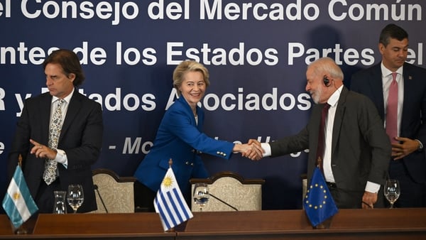 European Commission President Ursula von der Leyen shaking hands with Brazil's President Luiz Inacio Lula da Silva