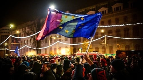 Analysts said the election ruling may erode institutions, trigger street protests and ultimately still endanger the nation's pro-Western course
