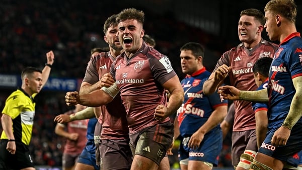 Alex Kendellen celebrates scoring Munster's third try