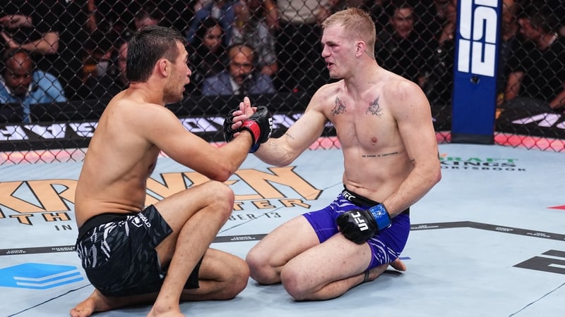 Ian Machado Garry and Shavkat Rakhmonov shake hands at the end of the gruelling contest