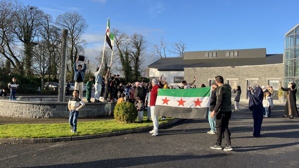Syrians pictured celebrating the collapse of the Assad regime in Ballaghaderreen