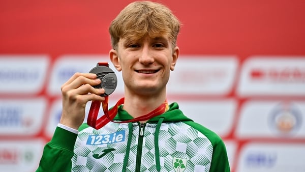 Nick Griggs with his silver medal