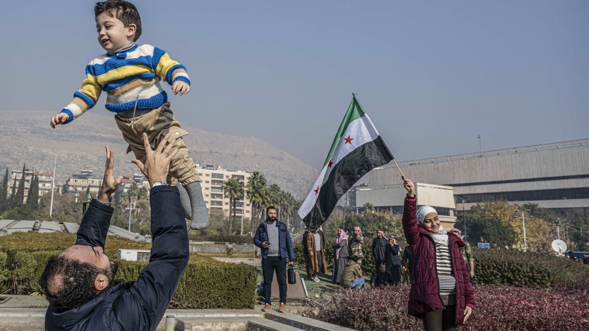 Syrians search for loved ones while rejoicing in Assad's fall