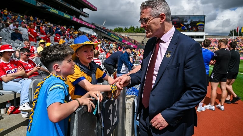 GAA president Jarlath Burns speaking to young Clare supporters before the 2024 All-Ireland SHC final
