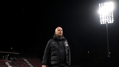 Arne Slot inspecting the Girona pitch on Monday evening