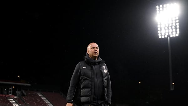 Arne Slot inspecting the Girona pitch on Monday evening