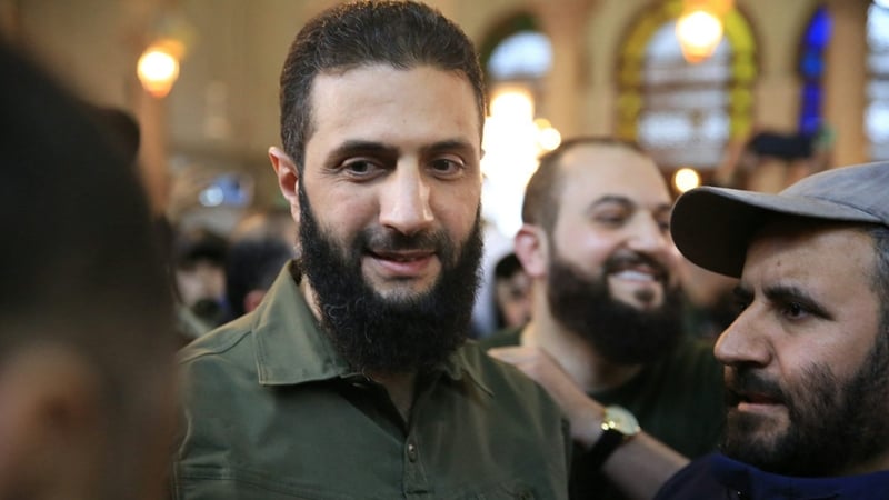 Abu Mohammed al-Jolani with supporters at the Umayyad Mosque in Damascus on Sunday last. Photo: Aref Tammawi/AFP via Getty Images