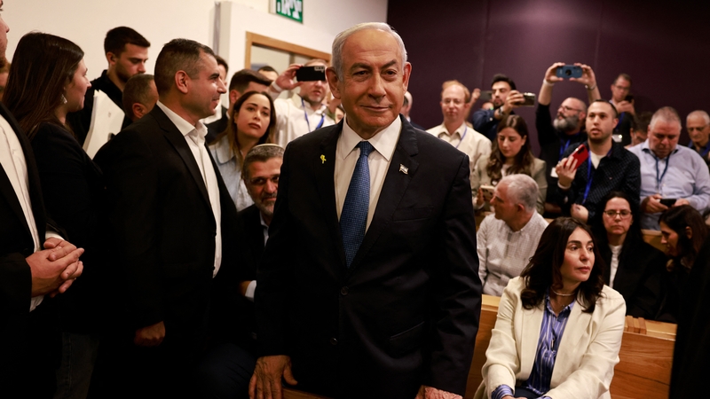 Benjamin Netanyahu smiled as he prepared to testify in his trial