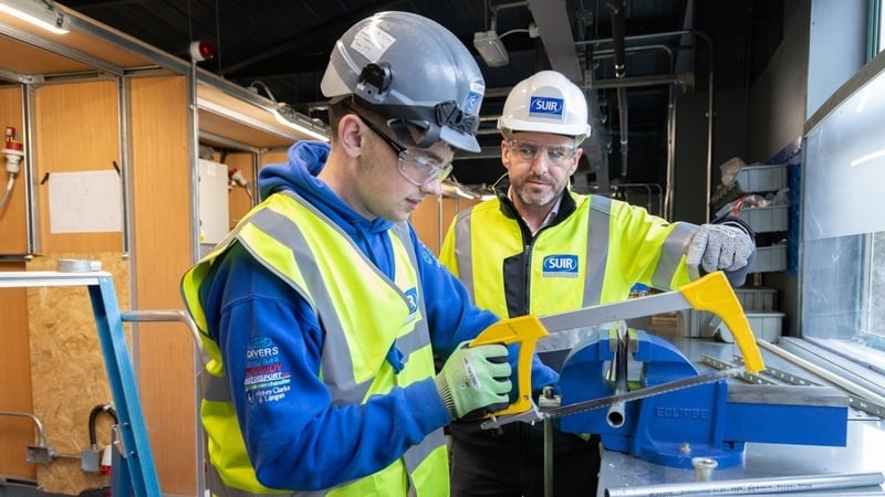 Apprentice Cillian Kelly and Brendan Moley, COO of Suir Engineering