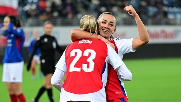 Alessia Russo celebrates scoring her team's third goal with Katie McCabe