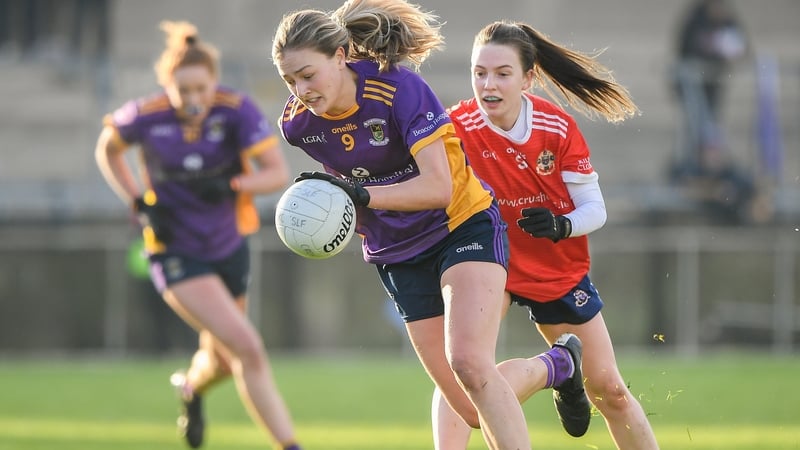 Grace Kos of Kilmacud Crokes (L) in action against Hannah Noone of Kilkerrin-Clonberne during last year's All-Ireland semi-final