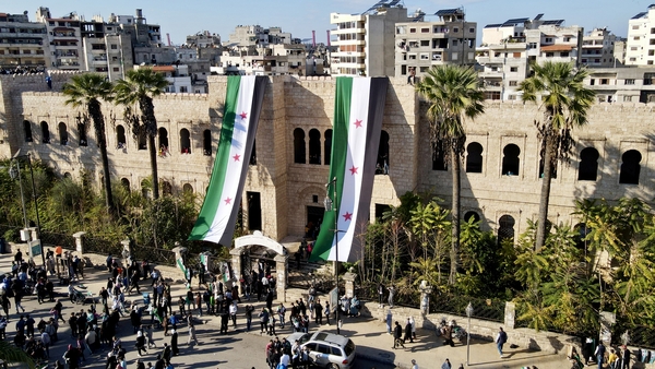 Thousands flocked to the capital's landmark Umayyad Mosque, some raising the three-star Syrian independence flag which none dared wave in the capital during Assad's repressive rule