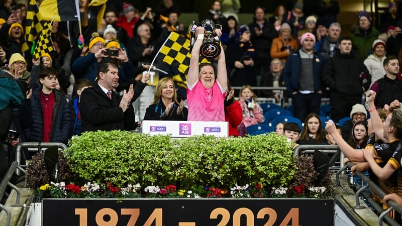 Bennekerry/Tinryland goalkeeper Shannon Cotter lifts the Cup as the Carlow side win the intermediate title