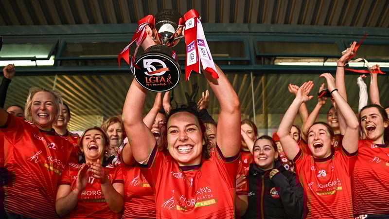 Mungret St Paul's captain Áine Ryan lifts the trophy after her side's victory in the All-Ireland Junior Club Football Championship