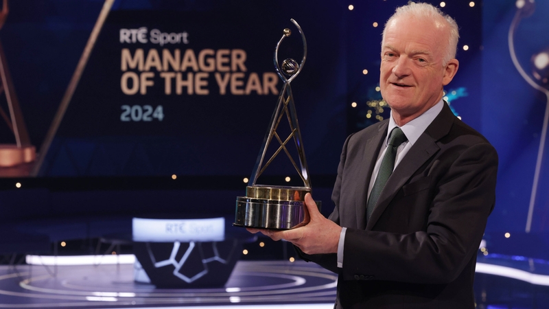Willie Mullins poses with his RTÉ Sport Manager of the Year trophy
