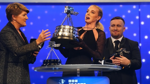 BBC's Sports Personality of the Year Keely Hodgkinson hoists the trophy aloft at the awards ceremony in Salford