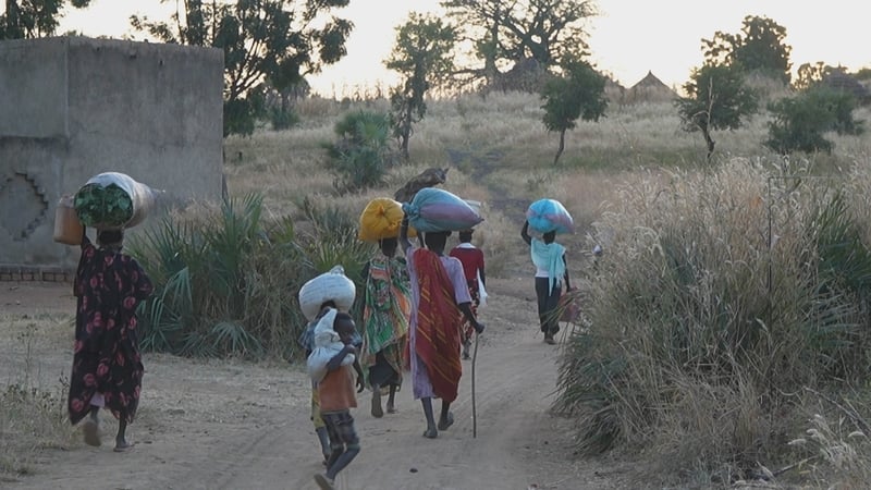 Many people walk long distances to reach the Tobo displacement camp in the Nuba Mountains area