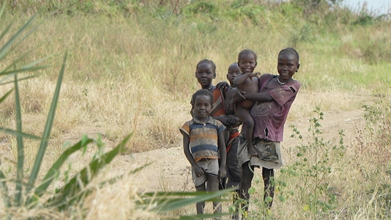 Children gathered at the Trócaire-run Amdulu Health Centre in the Nuba Mountains