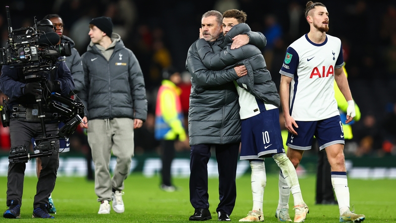 Ange Postecoglou hugs James Maddison after Tottenham Hotspur beat Manchester United