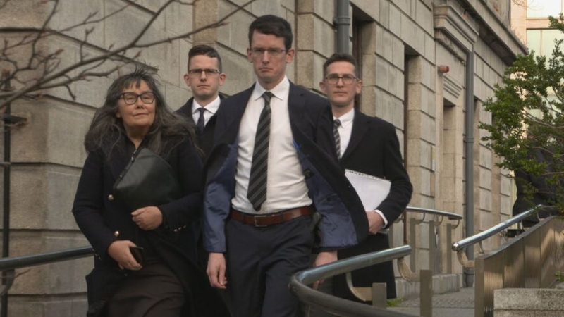 Enoch Burke, front right, was immediately released from prison custody after the judge left the courtroom