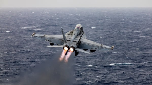 A US military F/A-18 fighter jet seen taking off from the USS Dwight D Eisenhower aircraft carrier during operations the Red Sea in March