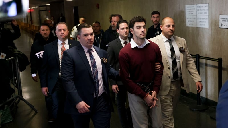 Luigi Mangione arrives at Manhattan Criminal Court in New York