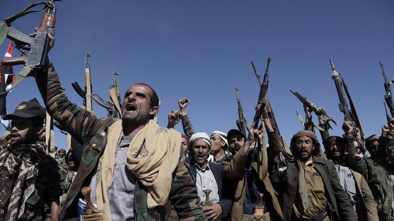 Yemen's Houthi loyal fighters shout slogans as they participate in an armed-tribal gathering against Israel and its main allies
