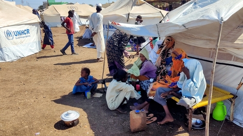 Sudanese people who fled escalating violence in the al-Jazira state rest at a camp for the displaced in the eastern city of Gedaref on 23 November
