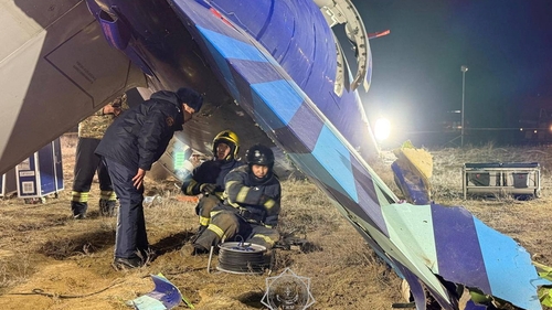 Emergency services work at the scene of the crash early this morning