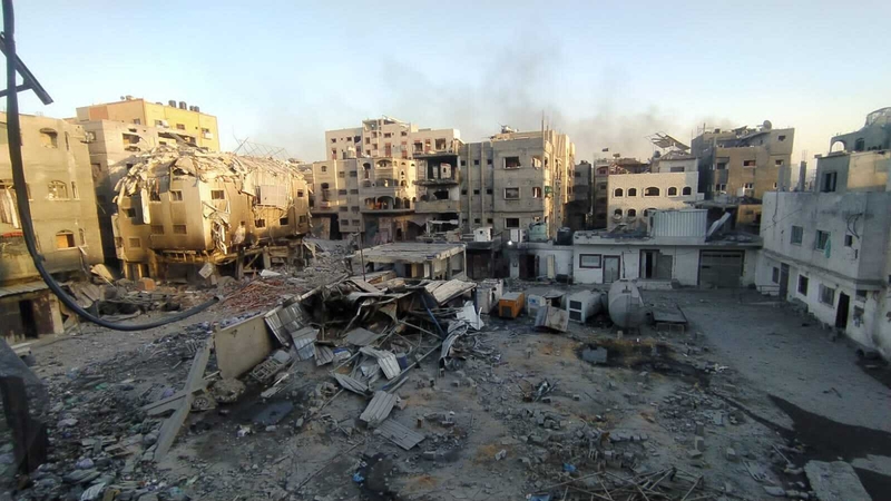 A view of destruction following the Israeli attack on the courtyard of Kamal Adwan Hospital and its surrounding buildings on Christmas Day