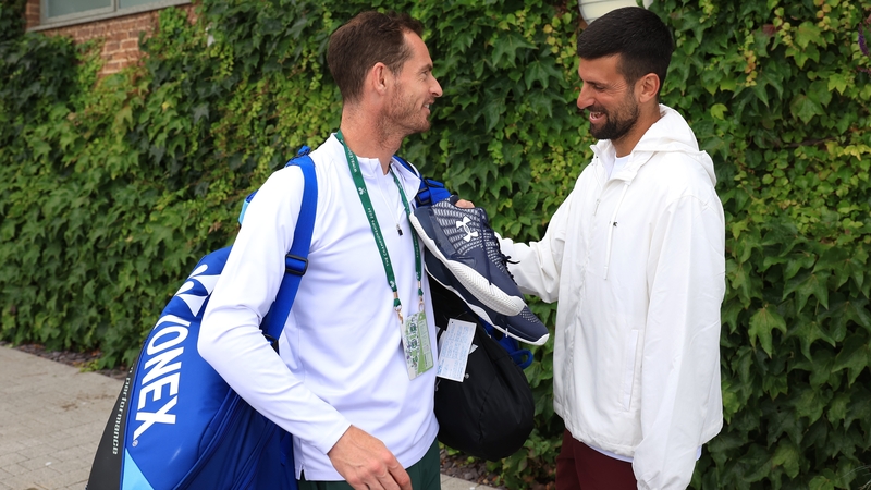 Andy Murray (L) with Novak Djokovic