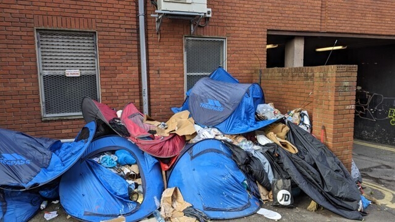 Tents used by international protection applicants piled up outside the International Protection Office on Mount Street