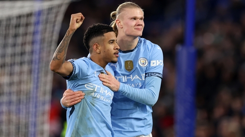 Manchester City goalscorers Erling Haaland (R) and Savinho