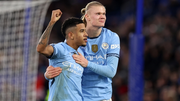 Manchester City goalscorers Erling Haaland (R) and Savinho