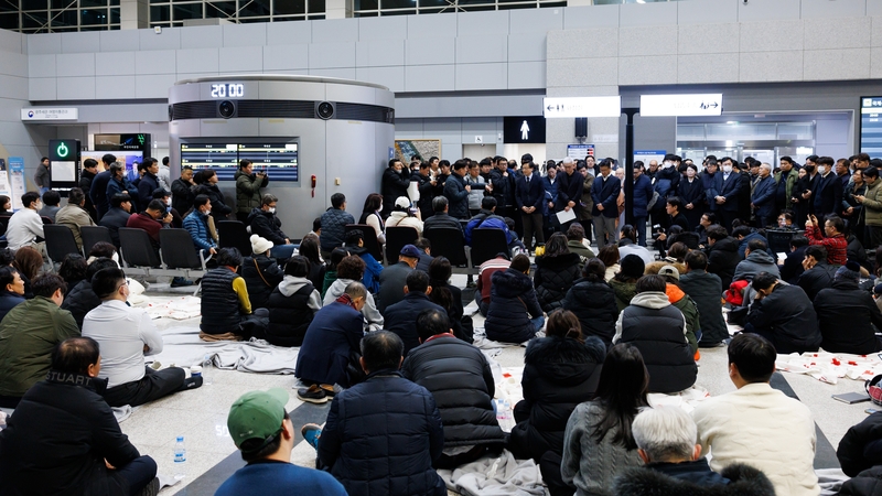 Family and relatives of victims of Jeju Air Co. Flight 2216 at Muan International Airport
